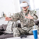 army soldier touching air during vr experience on couch - PhotoDune Item for Sale