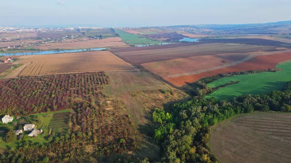 Flight over the fields behind the western Ukrainian village Aerial view.