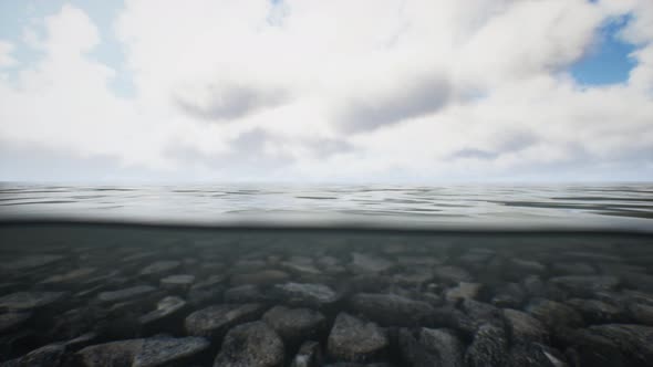 Ocean Seascape with Sky and Ocean Wave Splitted By Waterline to Underwater Part alt
