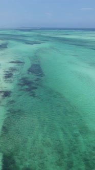 Tanzania  Vertical Video of the Ocean Near the Coast of Zanzibar Slow Motion alt