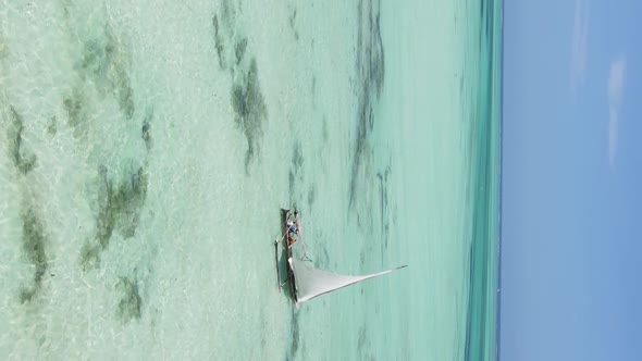 Tanzania Vertical Video  Boat Boats in the Ocean Near the Coast of Zanzibar Aerial View alt