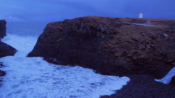 Iceland View Of Large Cliffs And The Ocean With Cave Blow Hole In Arnarstapi In Winter 1 alt