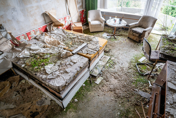 High angle shot of broken furniture in the abandoned house
