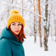 Young smiling woman enjoys snowy winter day - PhotoDune Item for Sale