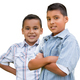 Two Happy Young Hispanic School Boys Isolated on White. - PhotoDune Item for Sale