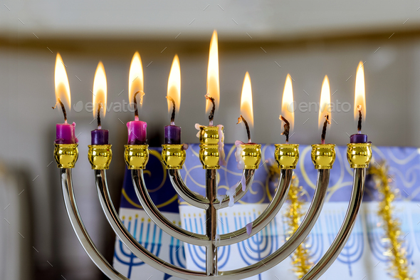 During Hanukkah Celebration, Candlelight Lights Up Hanukkah Menorah ...