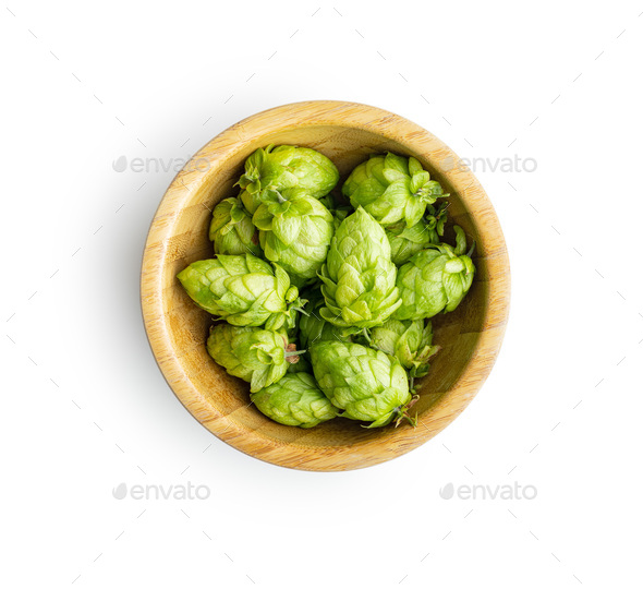 Green hops crop in bowl isolated on white background.