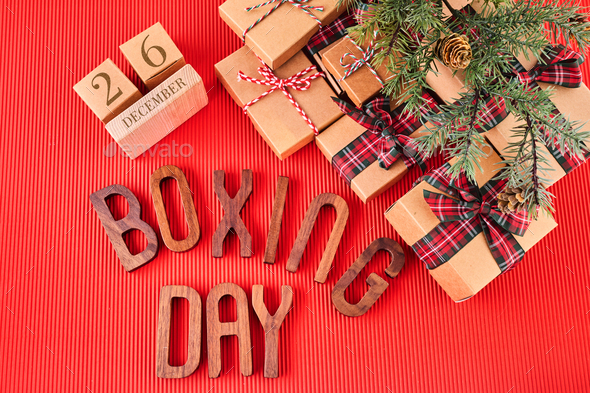 boxing-day-concept-different-kinds-of-gift-boxes-on-red-background
