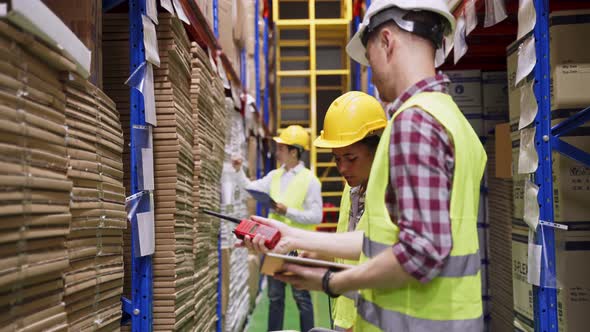 Group of diversity people worker wear safety helmet and mask working in warehouse plant factory. alt