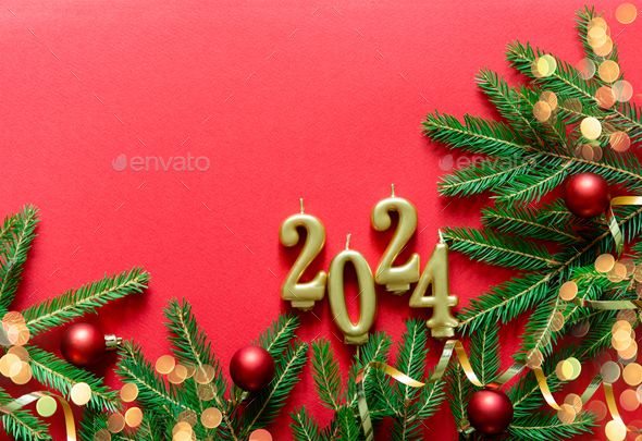 Happy New Years 2024. Many Christmas tree branches. Stock Photo by