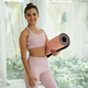 Sportswoman Standing with Yoga Mat - PhotoDune Item for Sale