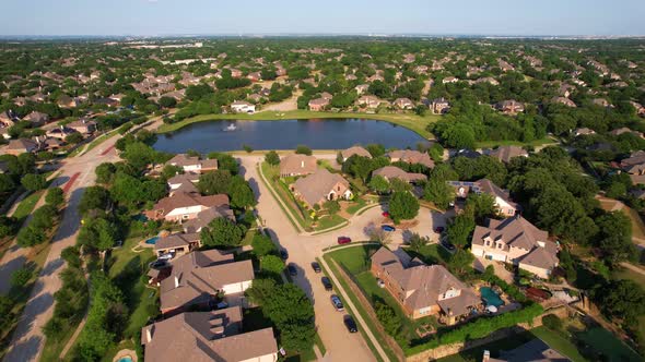 Aerial footage of a neighborhood in Flower Mound Texas. Location near Clearpoint Dr and Flower Mound alt