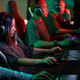 Asian Woman Playing Video Games and Wearing Headphones - PhotoDune Item for Sale