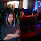 Young Asian Woman Posing Confidently in Gaming Club - PhotoDune Item for Sale