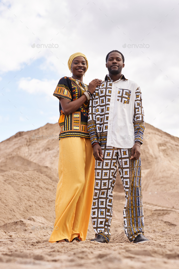 African American Couple in Traditional Clothing in Desert Stock Photo by  seventyfourimages
