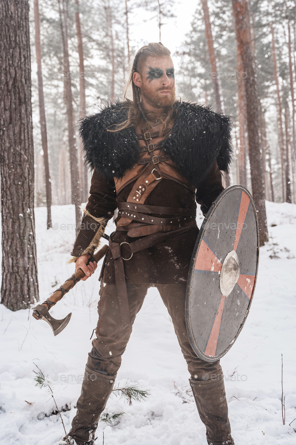 Norse Warrior Poised with Axe and Shield
