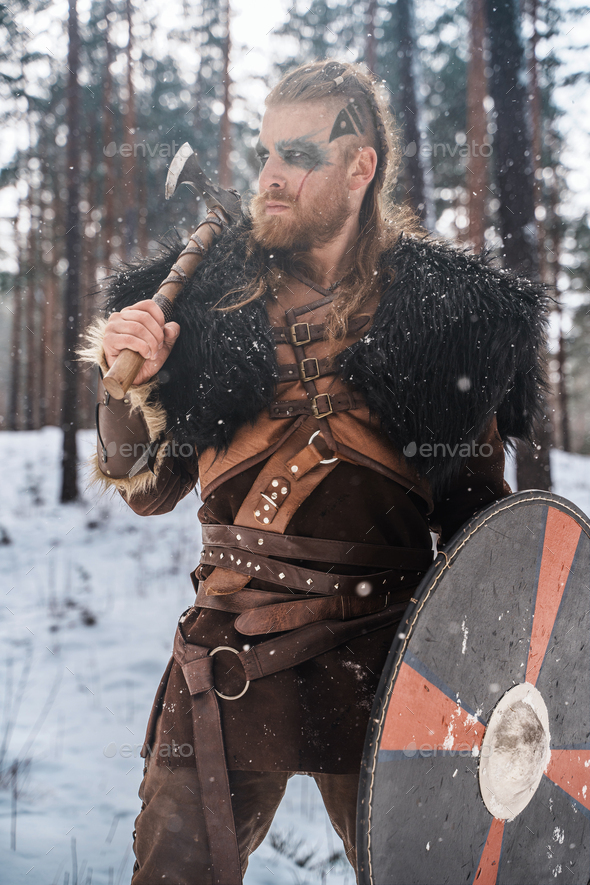 Norse Warrior Poised with Axe and Shield