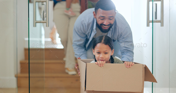 Dad with child in box, moving and playing in new home with property mortgage, future opportunity an