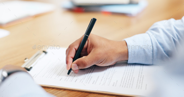 Closeup, hand and pen for clipboard in office for writing on legal form, compliance or application.