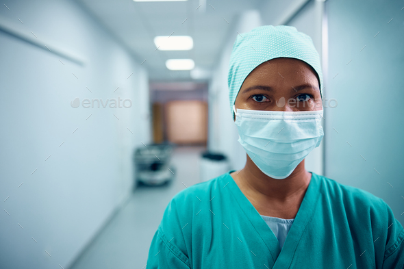 Portrait of black female surgeon looking at camera.