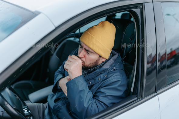 Drive Through Sickness Bearded Chauffeur Coughs in Seasonal Ailment