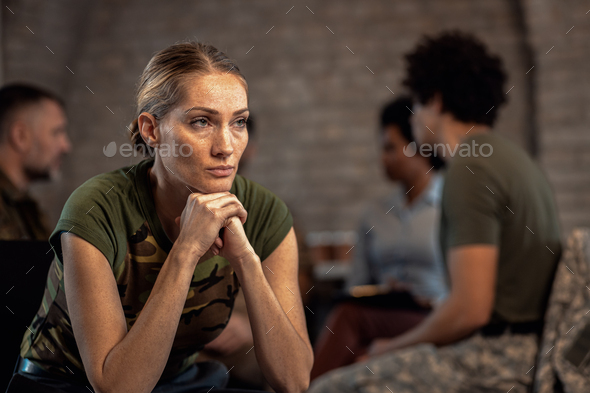 Portrait of female veteran in PTSD support group.