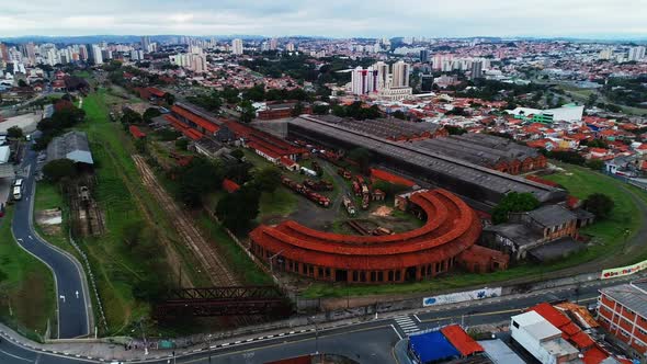 Aerial video of an old train station in the city of Campinas with abandoned wagons, Brazil. alt