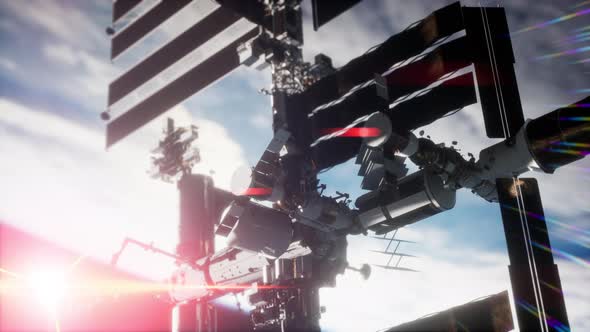 View of the Earth and International Space Station is Orbiting the Earth alt