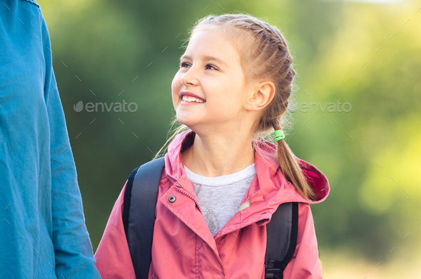 School girl looking up on mother Stock Photo by AFGreen | PhotoDune