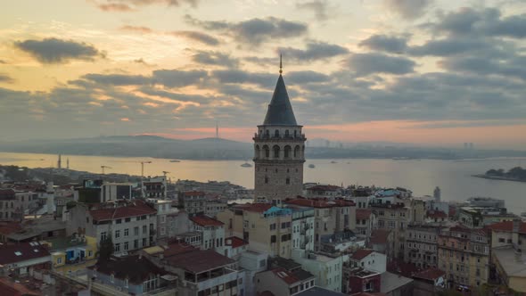 Galata Tower in Sunrise Sunlight, Aerial Hyperlapse Drone Time Lapse Circle Shot alt