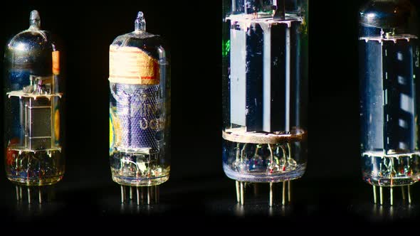 Some Old Used Valves On A Black Background