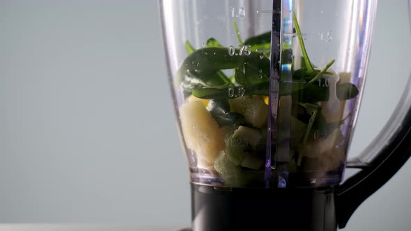 Soy Milk is Poured Into Blender to Make Vegan Smoothie alt