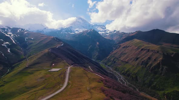 Ascending View of a Winding Road in the Caucasus Mountains Kazbegi Georgia alt