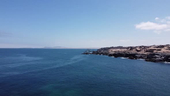 Aerial View of Rocky Coast of the Pacific Ocean in Atacama Region, Chile. alt