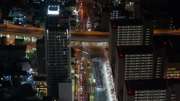 Osaka Night Highway Traffic Skyscrapers Timelapse alt