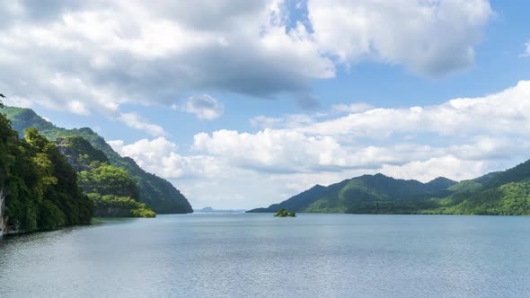 Beautiful lake reservoir and mountain in Kanchanaburi, Thailand - Time Lapse