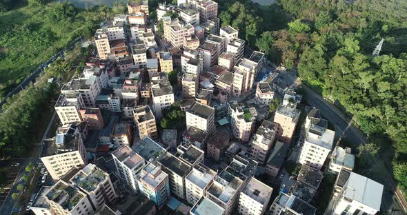 Aerial footage of sunrise urban village landscape  in Shenzhen city,China alt