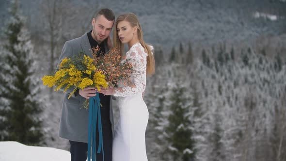 Couple Walking in the Winter Forest alt