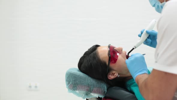 Cute Young Girl Is Being Examined By the Dentist