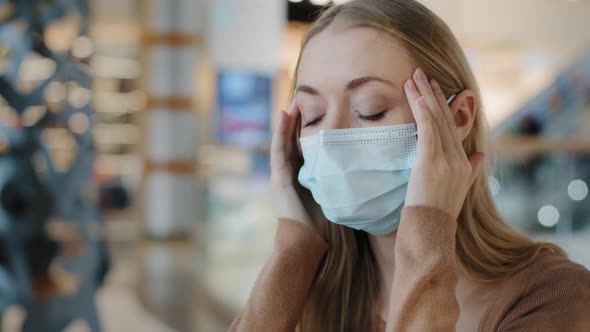 Caucasian Lady Sick Suffering Blonde Girl Ill Woman Wearing Medical Mask Holding Temples Forehead alt