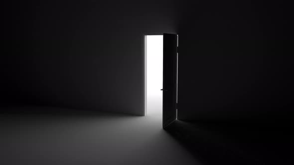 Opening the door in the dark, rays of light penetrate inside