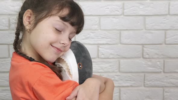 Playing with Plush Toy alt