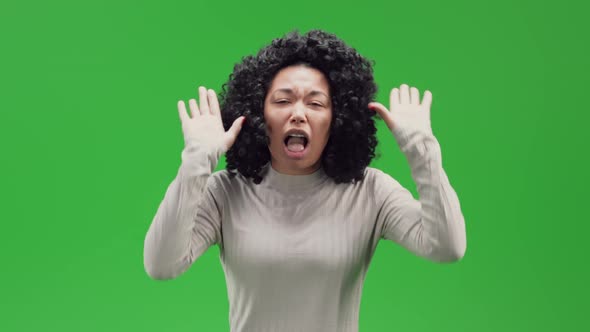 Green Screen Young African Female Grimacing