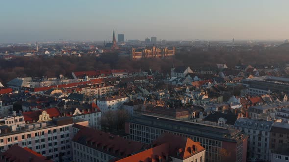 Rising Up Above Munich City Revealing Big Cityscape of Empty German Metropolitan Area in Winter alt