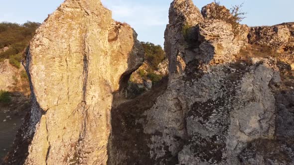 Aerial view through mountain hole alt