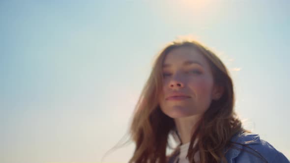 Portrait of Beautiful Woman in Sunlight alt