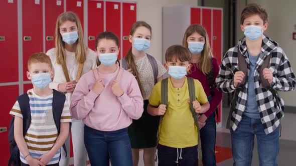 Video of group of school children wearing protective masks. Shot with RED helium camera in 8K. alt