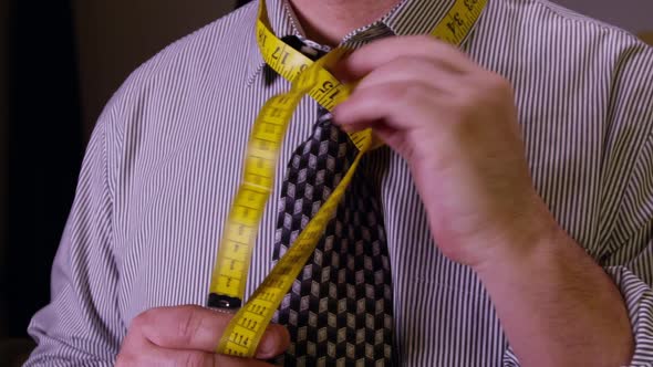 Tailor With Measuring Tape Hanging On The Neck 38