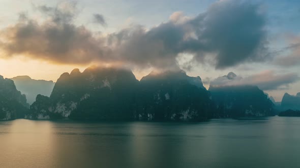 4K Hyperlapse aerial drone view of mountain peak in Khao Sok National Park at sunrise, Suratthani, T alt