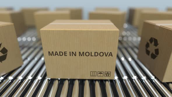 Cartons with MADE IN MOLDOVA Text on Roller Conveyor alt